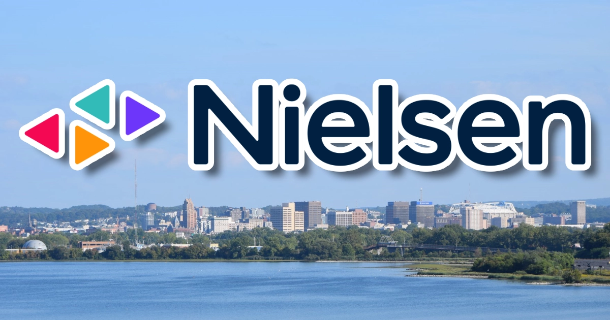 Nielsen logo over Syracuse skyline